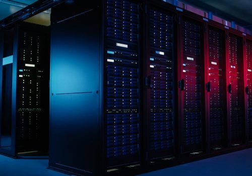 A sleek, modern data center with digital layers floating above servers.
